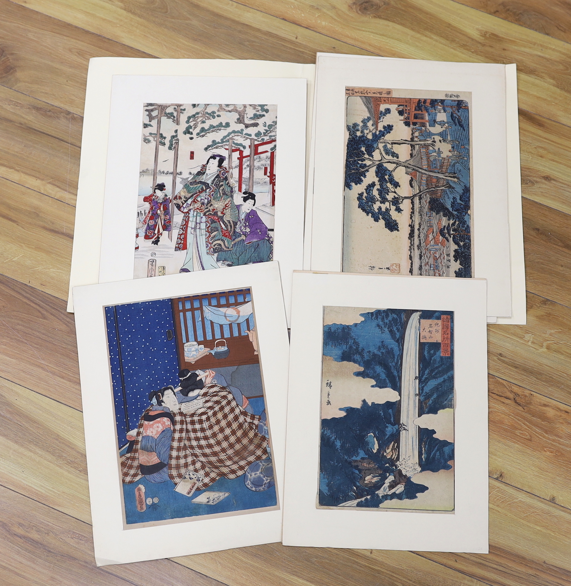 A folio of six Japanese woodblock prints, including examples after Utagawa Kunisada and Utagawa Kunisada II, mounted, unframed, 34 x 23cm